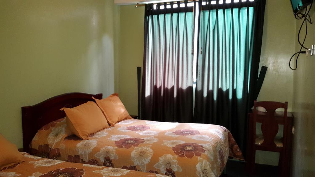 Hostal Los Lirios โลจา ภายนอก รูปภาพ